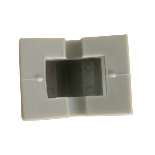 Rear view Beige plastic toggle switch cover on a white background