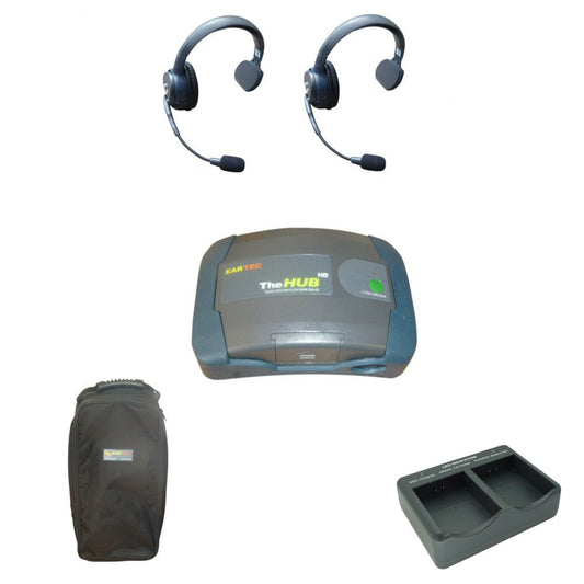 Set of three Eartec wirless single sided headsets, a hub device, a carrying case, and a control panel on a white background.