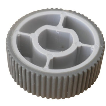 Reverse view shwoing fitting cavity of a grey control knob cap shown on a white background