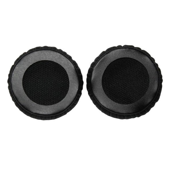 Two black earcushions showing rear circular edge attachment lip on a white background