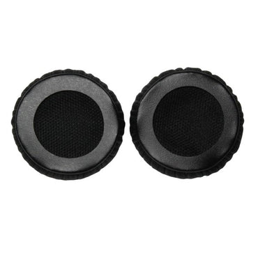 Two black earcushions showing rear circular edge attachment lip on a white background