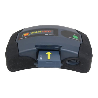 Grey extruded Eartec Conference module n side showing battery slot and yellow arrow on a battery on a white background