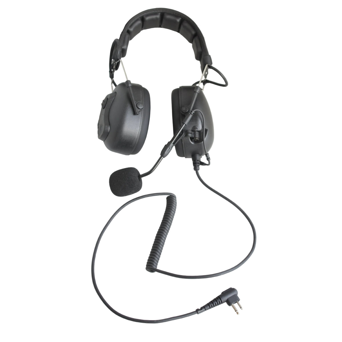 Black over-ear headset with attached boom microphone and coiled cable, photographed on a white surface against a white wall.