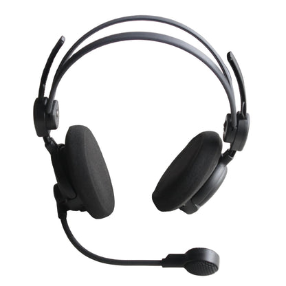 Front view of a black Sennheiser over-ear lightweight headset with a flexible boom microphone and split headband on a white surface