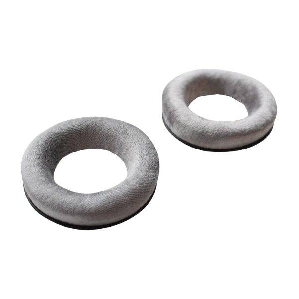 Front view Two grey Beyerdynamic EDT990V donut-shaped headphone cushions on a white background